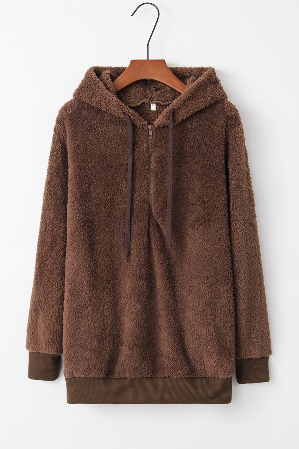 Full size quarter-zip drawstring teddy hoodie in soft brown with pocket, perfect for cozy wear.