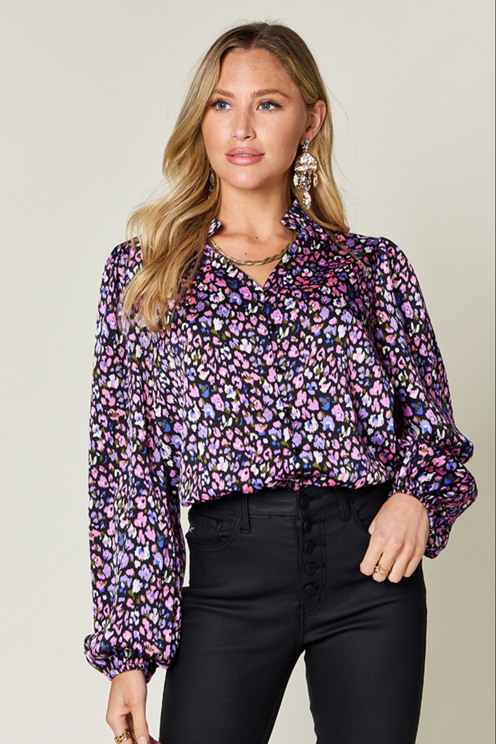 Double Take long sleeve blouse in colorful printed pattern, styled with black pants for a chic look.