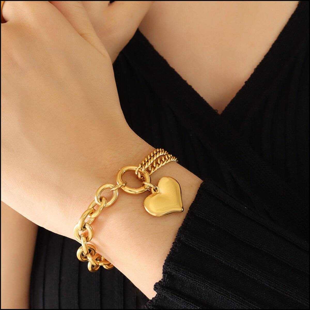 Half Chunky Chain Titanium Steel Bracelet with heart charm on wrist, elegant and stylish accessory for any outfit.
