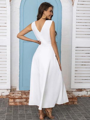 Back view of a white sleeveless midi dress with a V-neck, showcasing flowy design and elegant style.