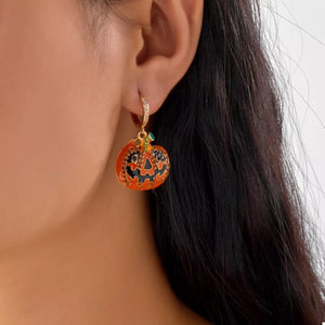 Gold-plated Halloween pumpkin drop earrings with rhinestone detail, perfect for festive occasions.
