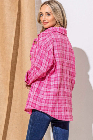 Back view of a woman wearing a pink tweed button-down shacket, showcasing its stylish design and warm fabric.