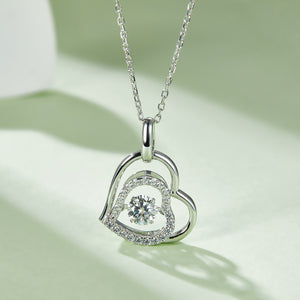 Moissanite 925 sterling silver heart necklace featuring 0.7 carat stone, elegantly designed for any occasion.