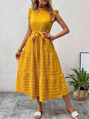 Tied ruffled cap sleeve midi dress in vibrant yellow, featuring a belted waist and a flowy, tiered design.