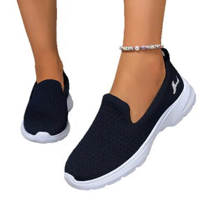 Lightweight breathable mesh slip-on shoes in navy blue with comfortable rubber soles, perfect for casual wear.