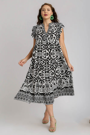 Umgee Plus Size Two-Tone Midi Dress with Ruffle Cap Sleeves and striking border print, perfect for various occasions.