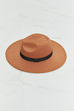 Tan fedora hat with black ribbon band, stylish and comfortable, suitable for various occasions.