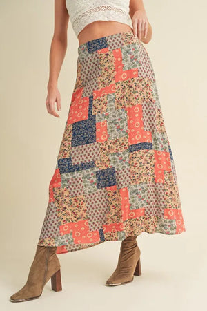 Aemi + Co Printed Maxi Skirt with colorful patchwork design, perfect for stylish summer outfits.