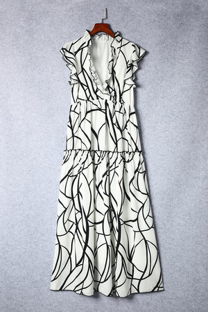 Ruffled printed surplice cap sleeve dress featuring a stylish black and white abstract design on a light background.