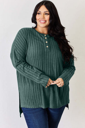 Plus-size model wearing Basic Bae ribbed high-low long sleeve t-shirt with button detail.