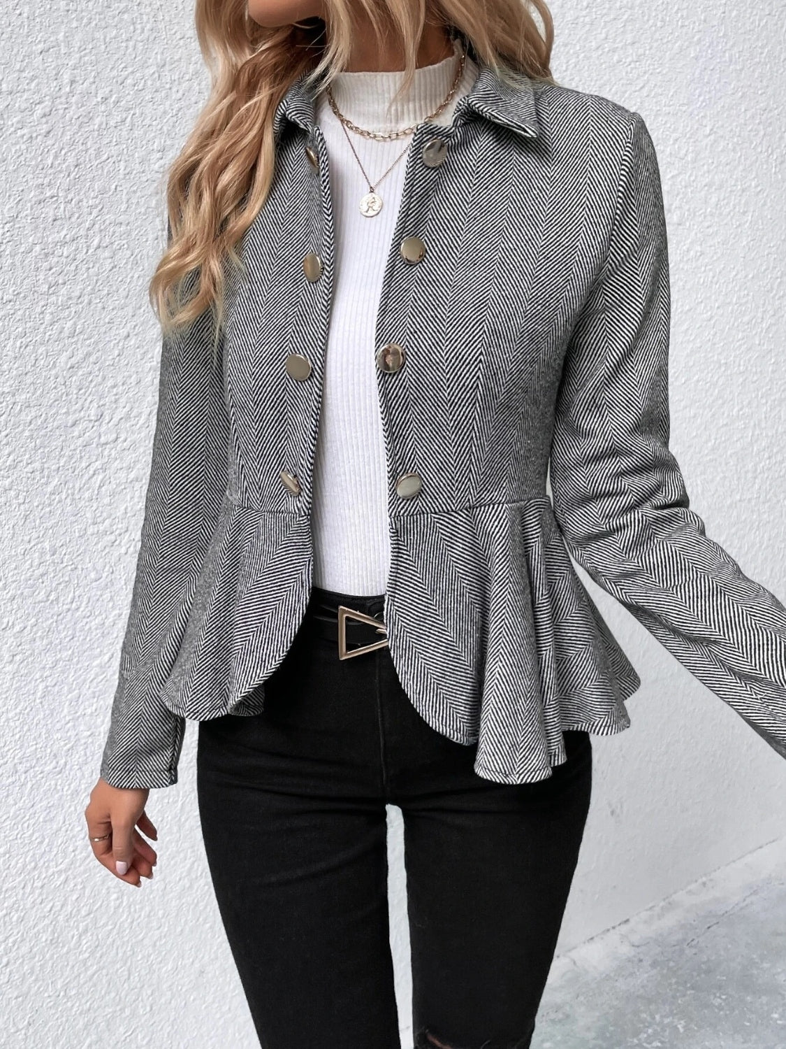 Stylish Ruffle Hem Collared Blazer in gray, featuring a peplum design, paired with a white top and black jeans.