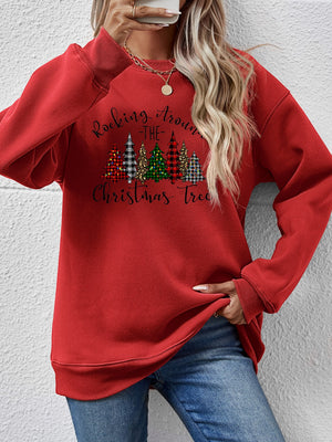 Red sweatshirt featuring Christmas tree graphic, perfect for festive holiday gatherings.