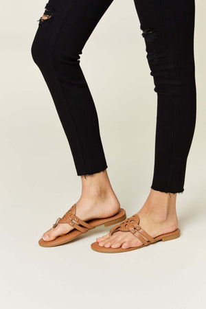 Stylish Forever Link Cutout PU Leather Open Toe Sandals paired with black ripped jeans for a chic look.