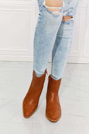 MMShoes Watertower Town ochre faux leather ankle boots paired with distressed jeans, showcasing a stylish Western look.