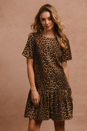 BiBi tie back leopard print dress with round neck and short sleeves, perfect for special occasions.