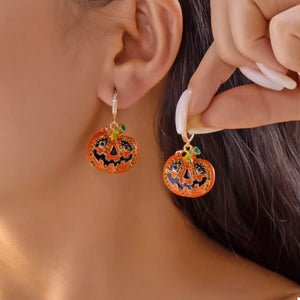 Halloween pumpkin drop earrings featuring orange and black design, 18K gold-plated for festive style and elegance.
