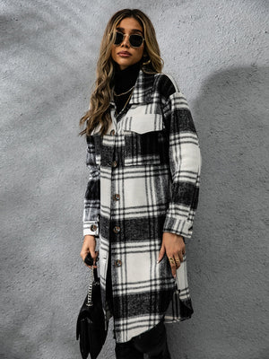 Stylish woman in plaid collared coat with long sleeves and button-up front, perfect for chilly weather.