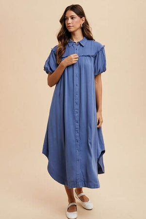 Model wearing the Annie Wear Mineral Washed Button Down Puff Sleeve Shirt Dress in blue, showcasing its trendy style and comfort.