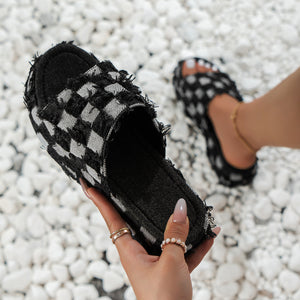 Stylish plaid platform sandals in black and white, perfect for chic casual wear, featuring a comfortable design.