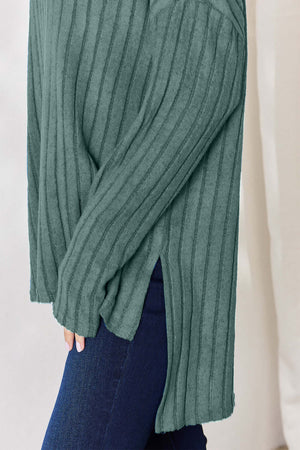 Close-up of a ribbed green high-low t-shirt featuring a side slit, perfect for casual comfort with a touch of style.