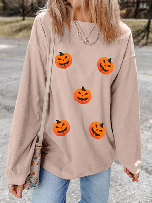 Stylish Halloween pumpkin drop shoulder sweatshirt in beige with vibrant pumpkin designs.
