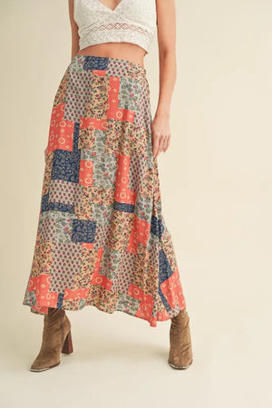 Aemi + Co Printed Maxi Skirt featuring a bold patchwork pattern, perfect for casual or dressy summer outfits.
