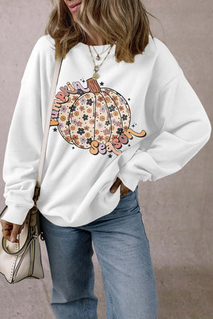 Pumpkin Season long sleeve sweatshirt featuring a stylish pumpkin graphic, perfect for autumn fashion.