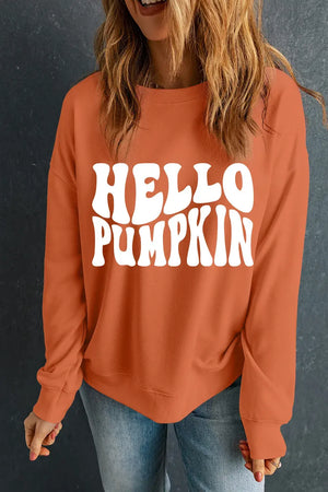 Hello Pumpkin round neck long sleeve sweatshirt in burnt orange color, perfect for fall fashion.