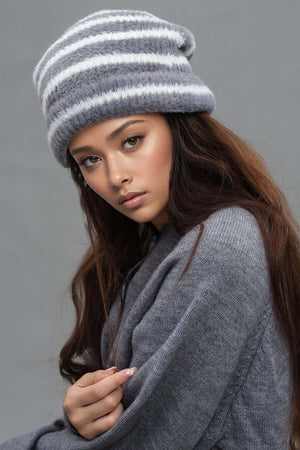 Fuzzy contrast striped thermal hat in gray, made of nylon, perfect for warmth and style in colder weather.