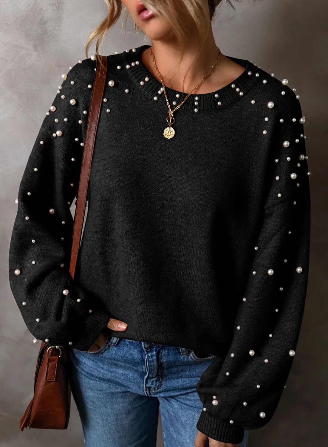 Black pearl detail round neck long sleeve sweater, slightly stretchy, perfect for casual outfits.