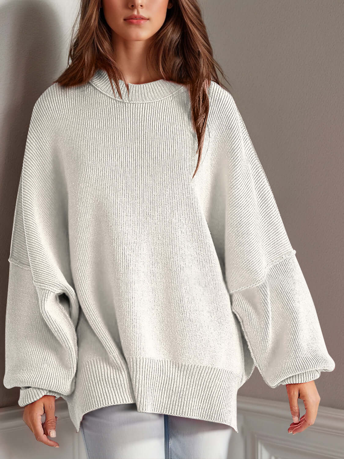 Cozy side-slit sweater with round neck, perfect for winter fashion. Soft fabric for ultimate comfort and style.
