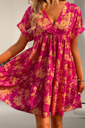 Printed surplice short sleeve mini dress with pink and floral pattern, perfect for casual outings or summer wear.