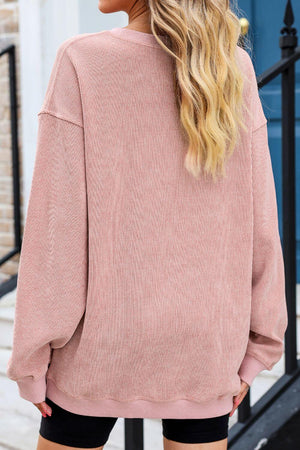 Back view of heart round neck dropped shoulder sweatshirt in blush pink, featuring a relaxed fit and soft, textured fabric.