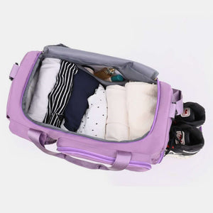 Interior view of an oversized Oxford cloth travel bag showing neatly packed clothing and shoes, ideal for travel.