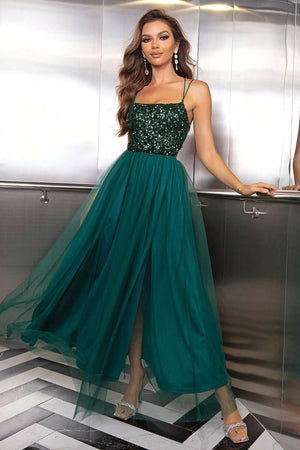 Stunning green lace-up backless mesh dress with a sequined bodice and flowing tulle skirt, perfect for special occasions.