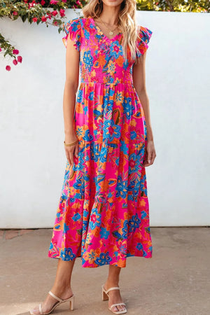 Boho floral V-neck ruffle tiered dress with vibrant colors and floral patterns, perfect for summer occasions.