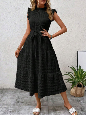 Elegant black midi dress with tied, ruffled cap sleeves and tiered design, perfect for stylish summer outings.