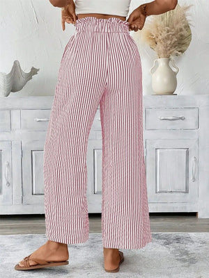Full size striped wide leg paper bag pants in red and white, featuring a tied waist and pockets.