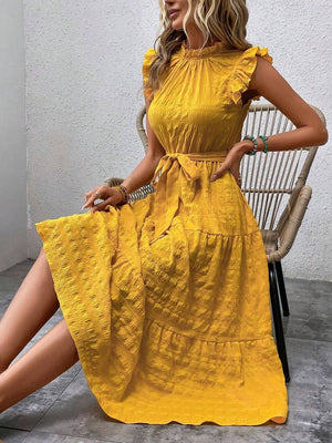 Stylish Tied Ruffled Cap Sleeve Midi Dress in vibrant yellow, featured on a model sitting on a chair.