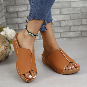 Brown PU leather open toe sandals with low heels, perfect for stylish summer looks.
