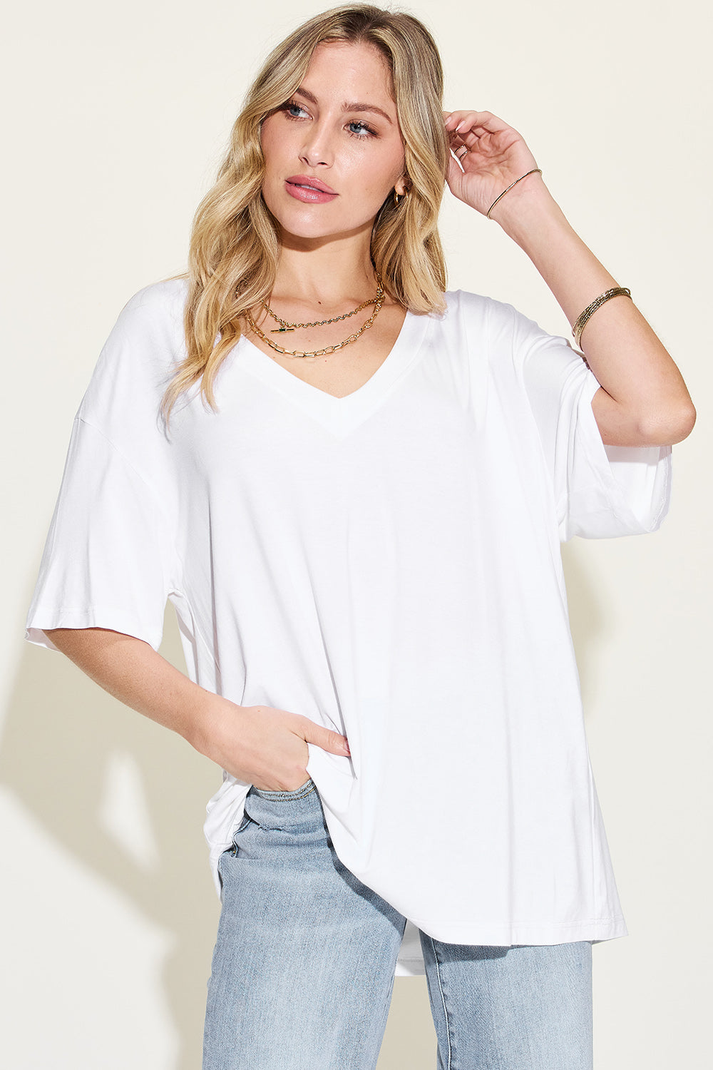 Basic Bae women's white bamboo V-neck drop shoulder t-shirt with pockets, casual and stylish.