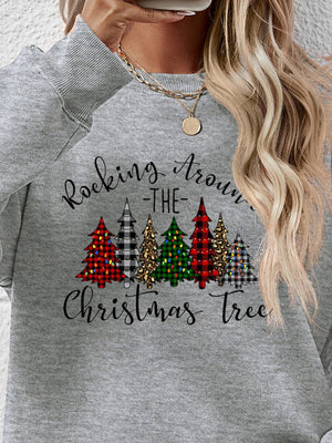 Cozy gray sweatshirt featuring colorful Christmas tree graphic and text 'Rocking Around the Christmas Tree'.