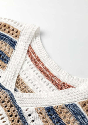 Close-up of striped hollow out half sleeve knit top showcasing detailed knit texture and color pattern.
