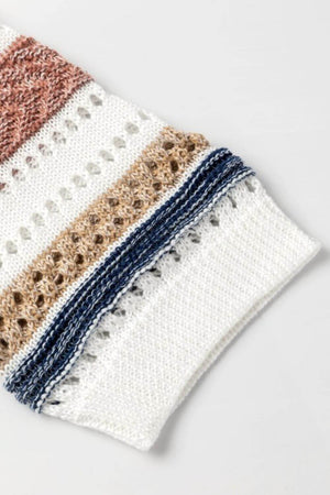 Close-up of striped hollow-out half sleeve knit top showcasing intricate knit patterns and color details.