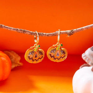 Cute Halloween pumpkin drop earrings with 18K gold plating, rhinestones, and green accents, perfect for festive celebrations.