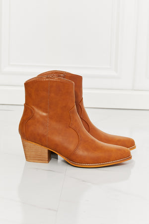 MMShoes Watertower Town faux leather western ankle boots in ochre with block heels and pointed toe.