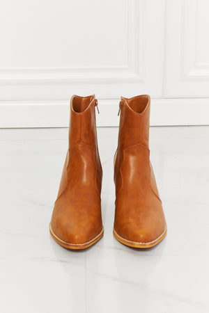 MMShoes Watertower Town faux leather western ankle boots in ochre with pointed toe and block heel.