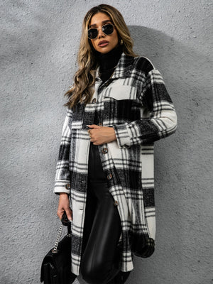 Stylish model wearing a plaid collared long sleeve coat, featuring a button-up front and sunglasses, perfect for chilly weather.