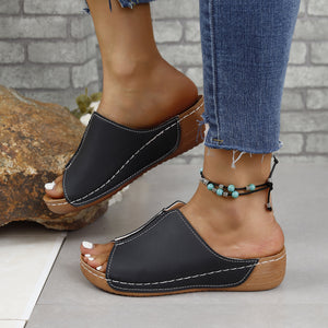 Black PU leather open toe sandals with low heel, perfect for casual summer outfits and comfortable wear.