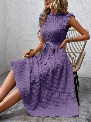 Tied ruffled cap sleeve midi dress in lavender, featuring a flattering fit and stylish silhouette.